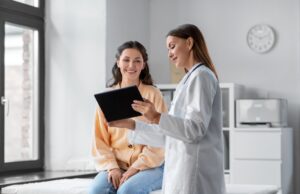 Two women, doctor and patient