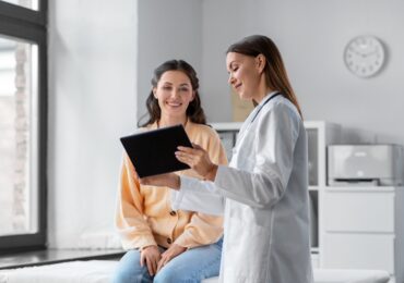 Two women, doctor and patient