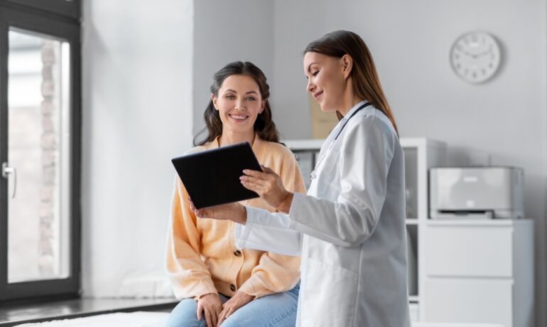 Two women, doctor and patient