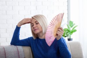 Woman experiencing menopause