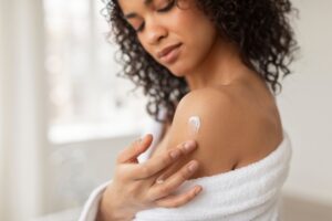 woman applying estradiol cream