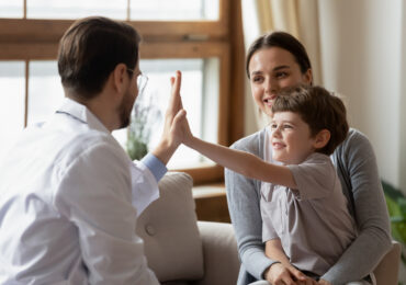 doctor meeting with mom and son