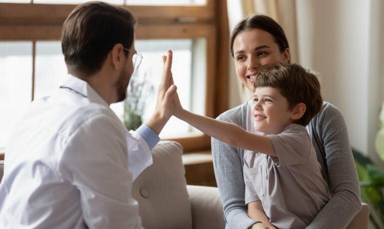 doctor meeting with mom and son